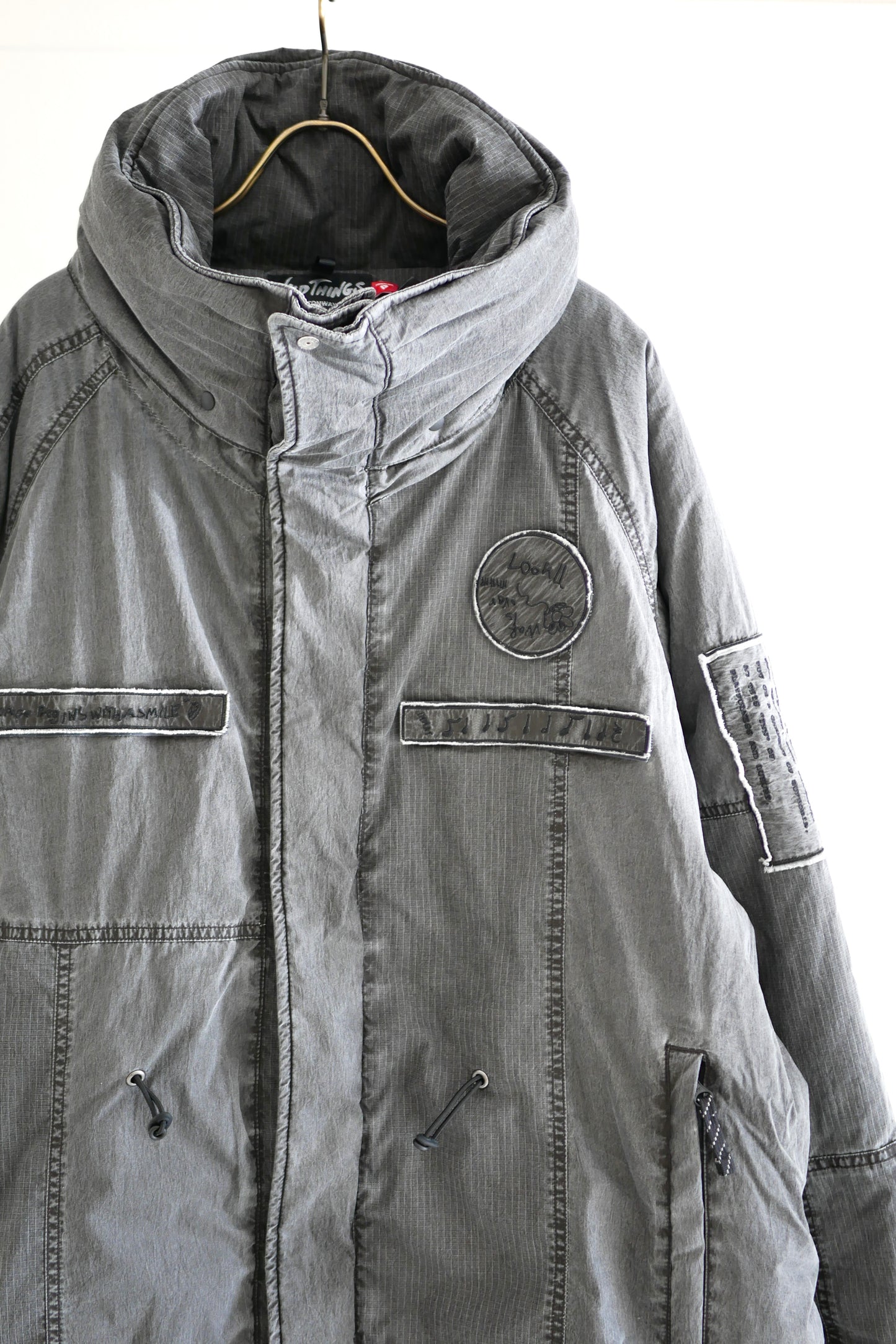 【10/17 12:00- ON SALE】INNAT x WILD THINGS / PADDED TACTICAL FIELD COAT (BLACK)