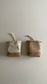 【unlike. exclusive】Leather Drawstring Pouch (Perforated Beige x Beige Suede)